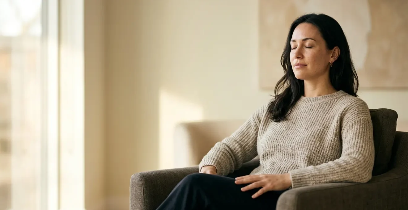 Person in peaceful meditation state releasing digital tension through body awareness