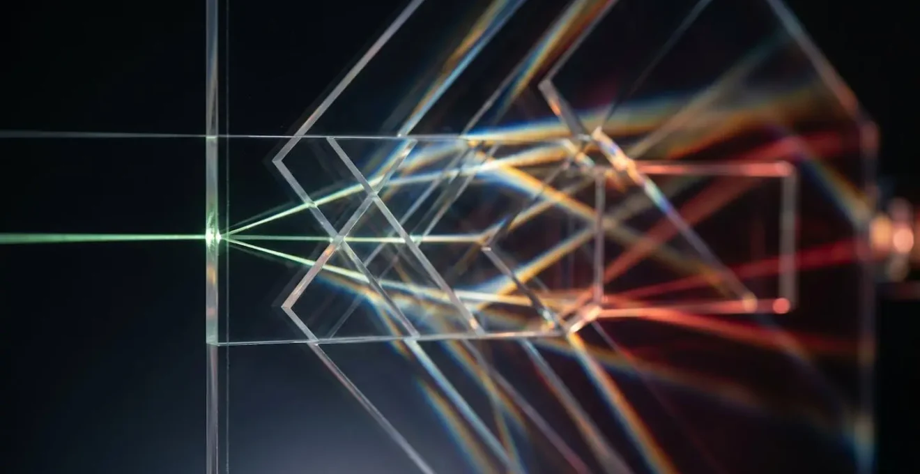 Abstract visualization of light ray bouncing through geometric surfaces with soft shadows and color bleeding effects