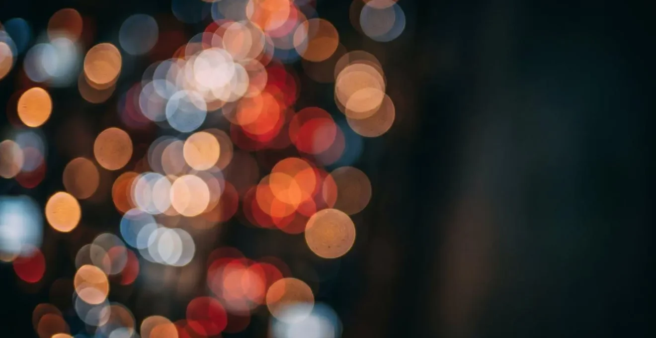 Abstract representation of overwhelming digital notifications through layered bokeh lights
