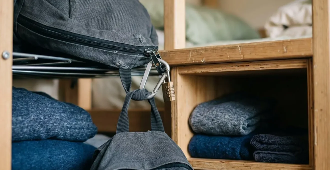 Well-organized and secured hostel bunk with minimalist intentional arrangement