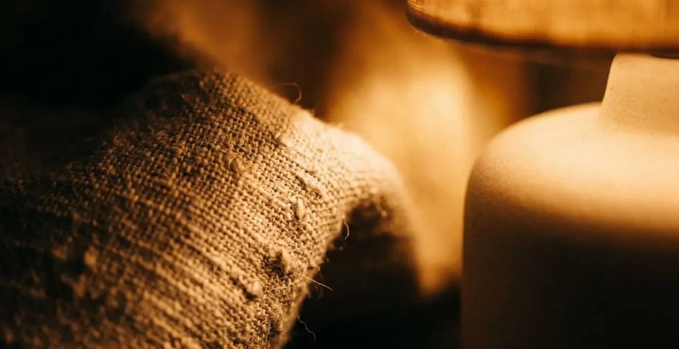Close-up view of warm amber lamp glow at 2700K creating soft golden hour atmosphere with gradient lighting for evening relaxation