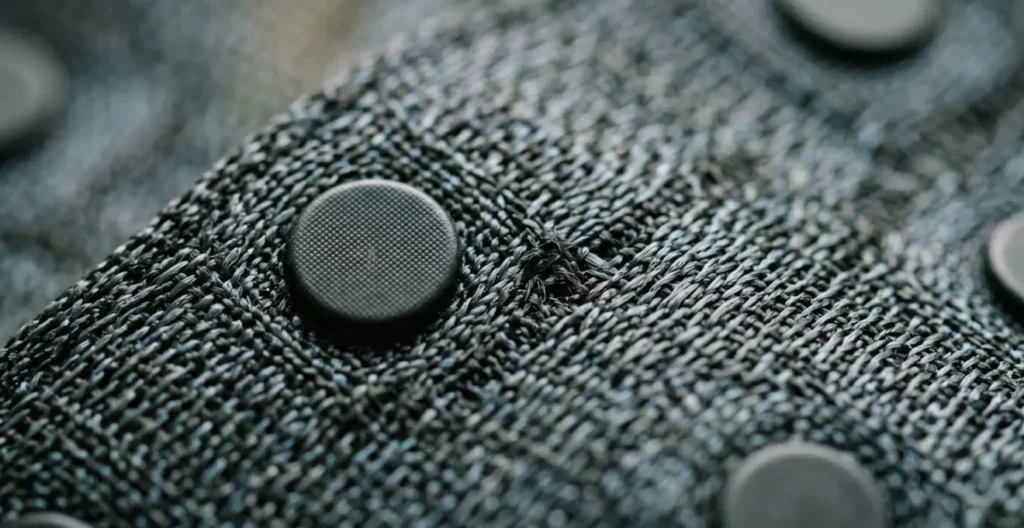 Macro detail of haptic actuator array showing precise tactile feedback zones Macro detail of haptic actuator array showing precise tactile feedback zones